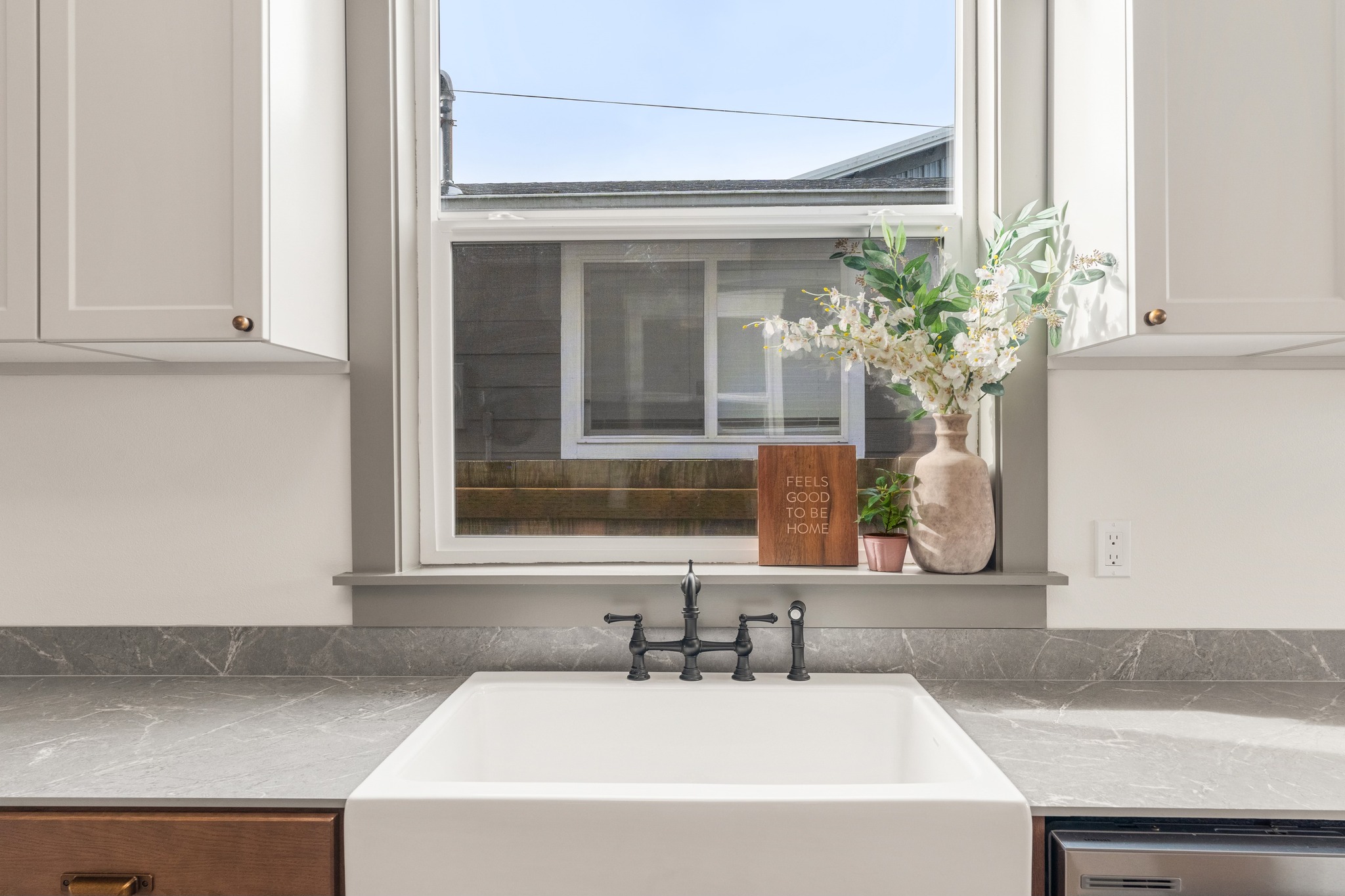 Eklund Ave — farmhouse sink and window detail