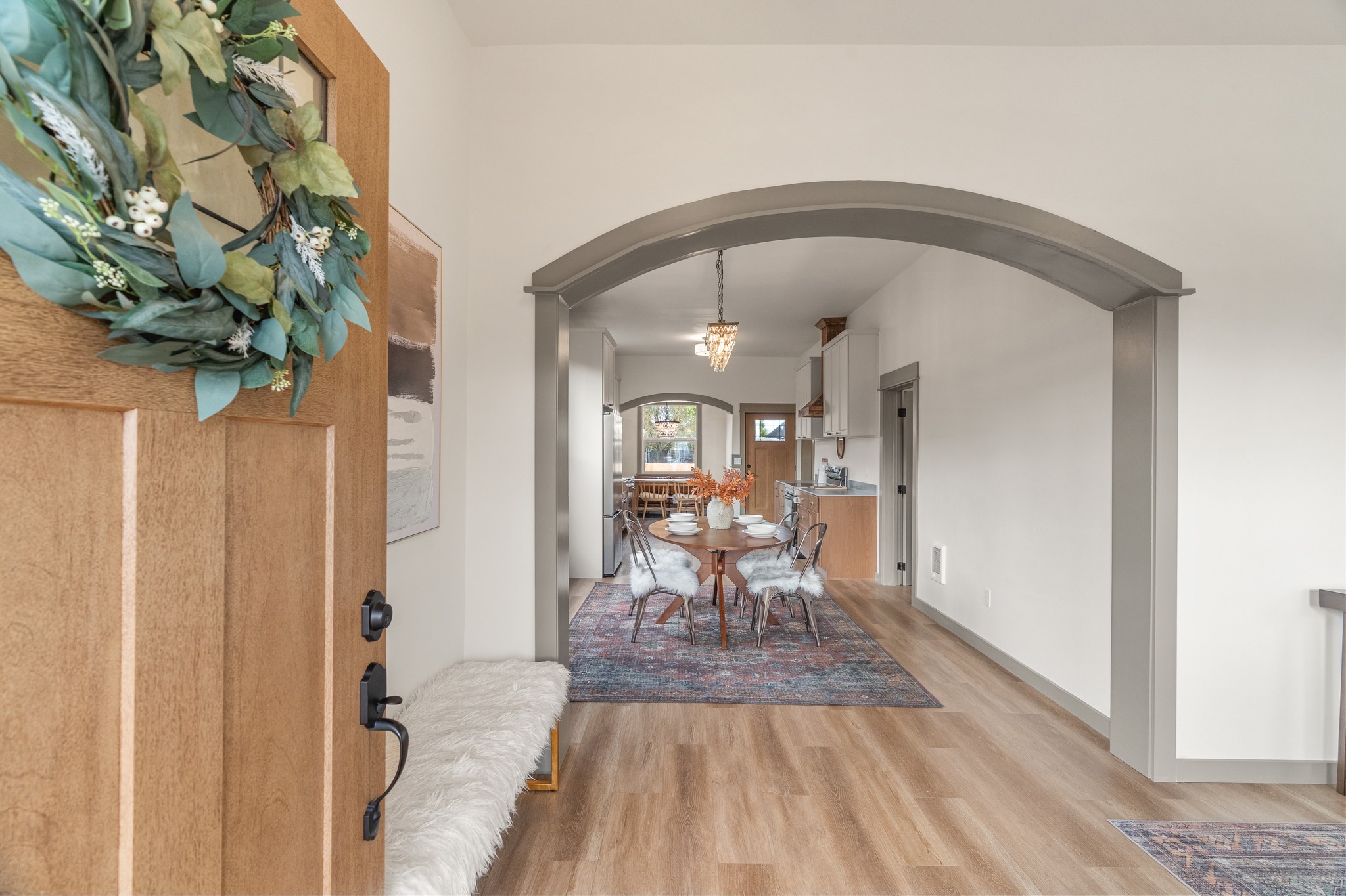 Eklund Ave — front entry with arched hallway into dining and kitchen