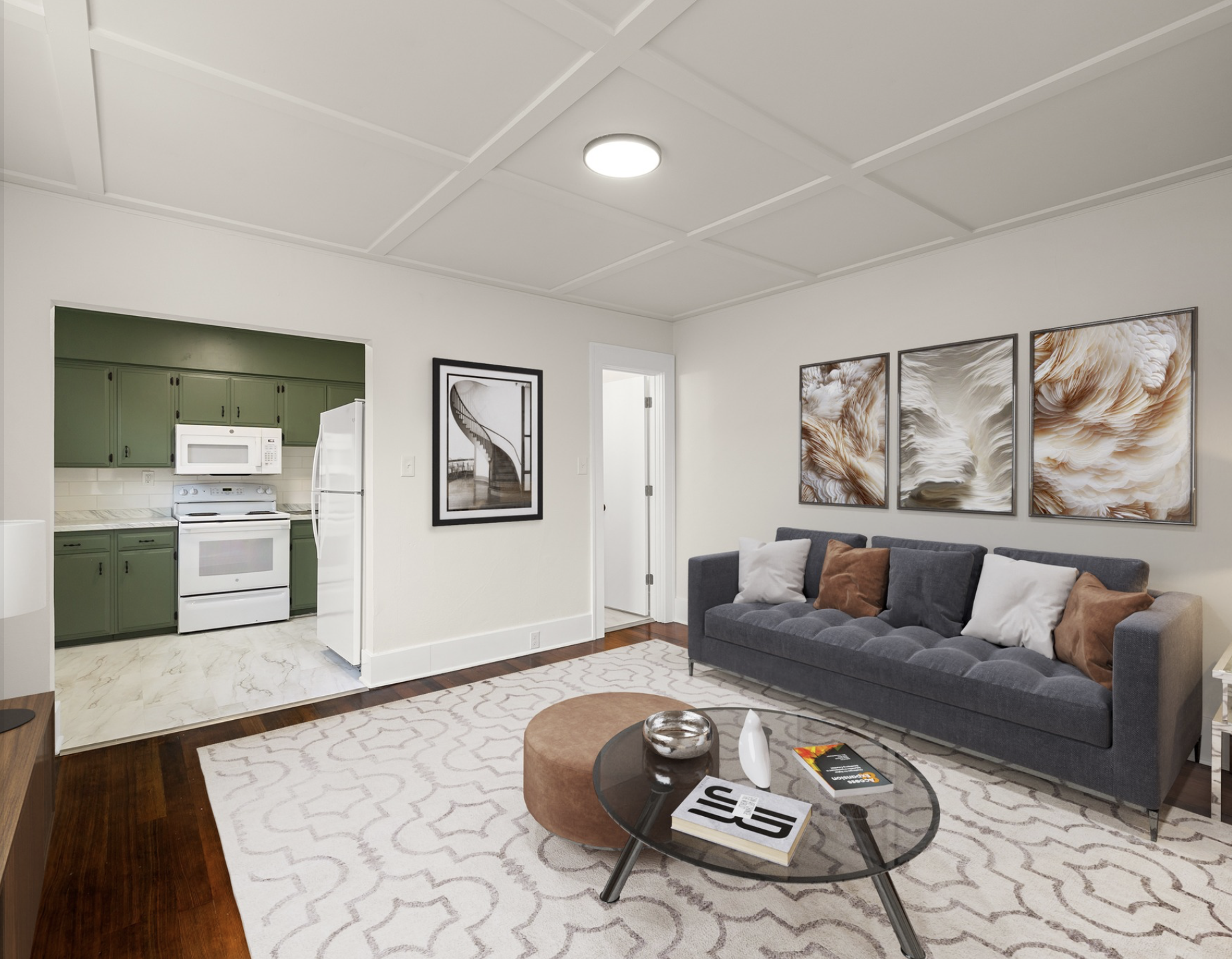 Mayflower Apartments — kitchen with sage green cabinets and marble counters