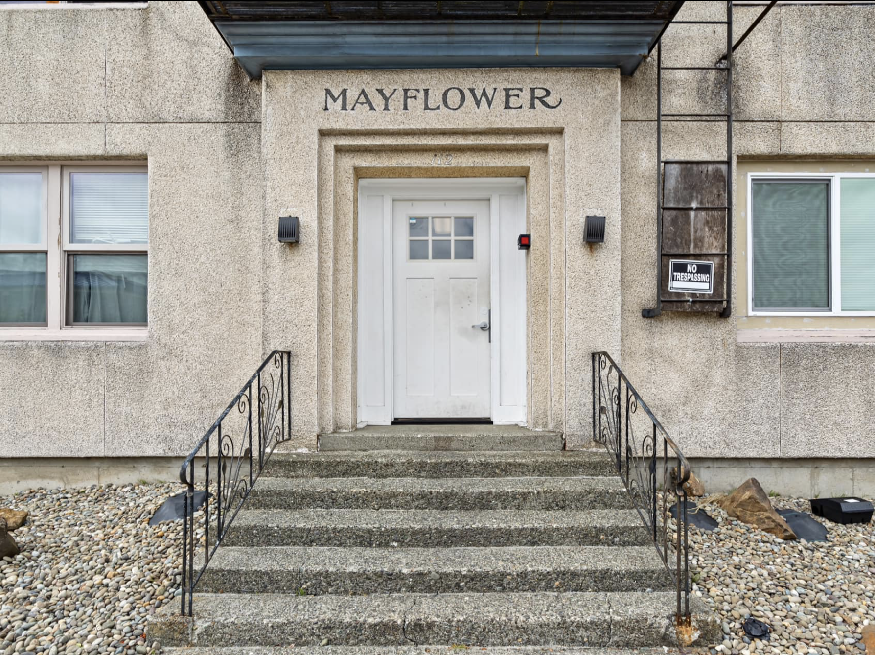 Mayflower Apartments — carved stone entry