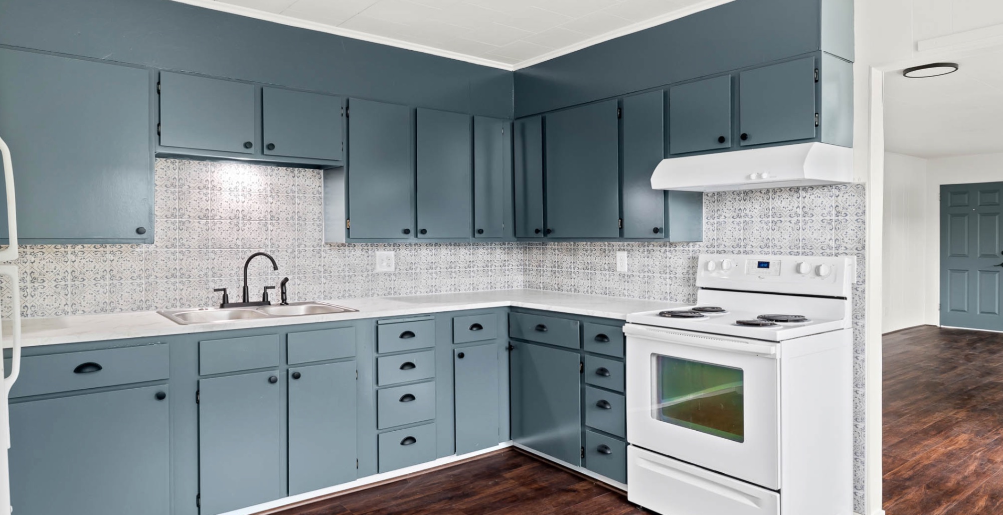 Perry Duplex — blue kitchen